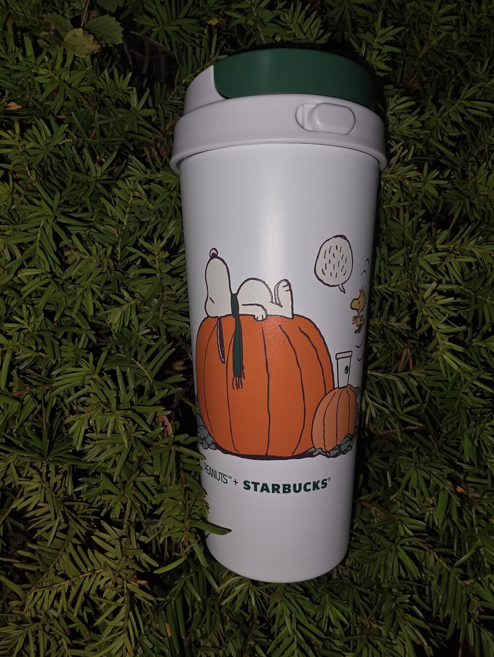Starbucks White Travel Tumbler with Green Lid and Orange Pumpkin Peanuts Art